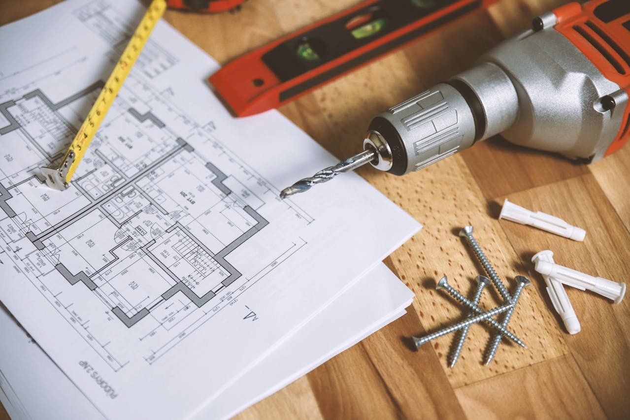 screwdriver-with-nails-and-home-building-plans screwdriver-with-nails-and-home-building-plans