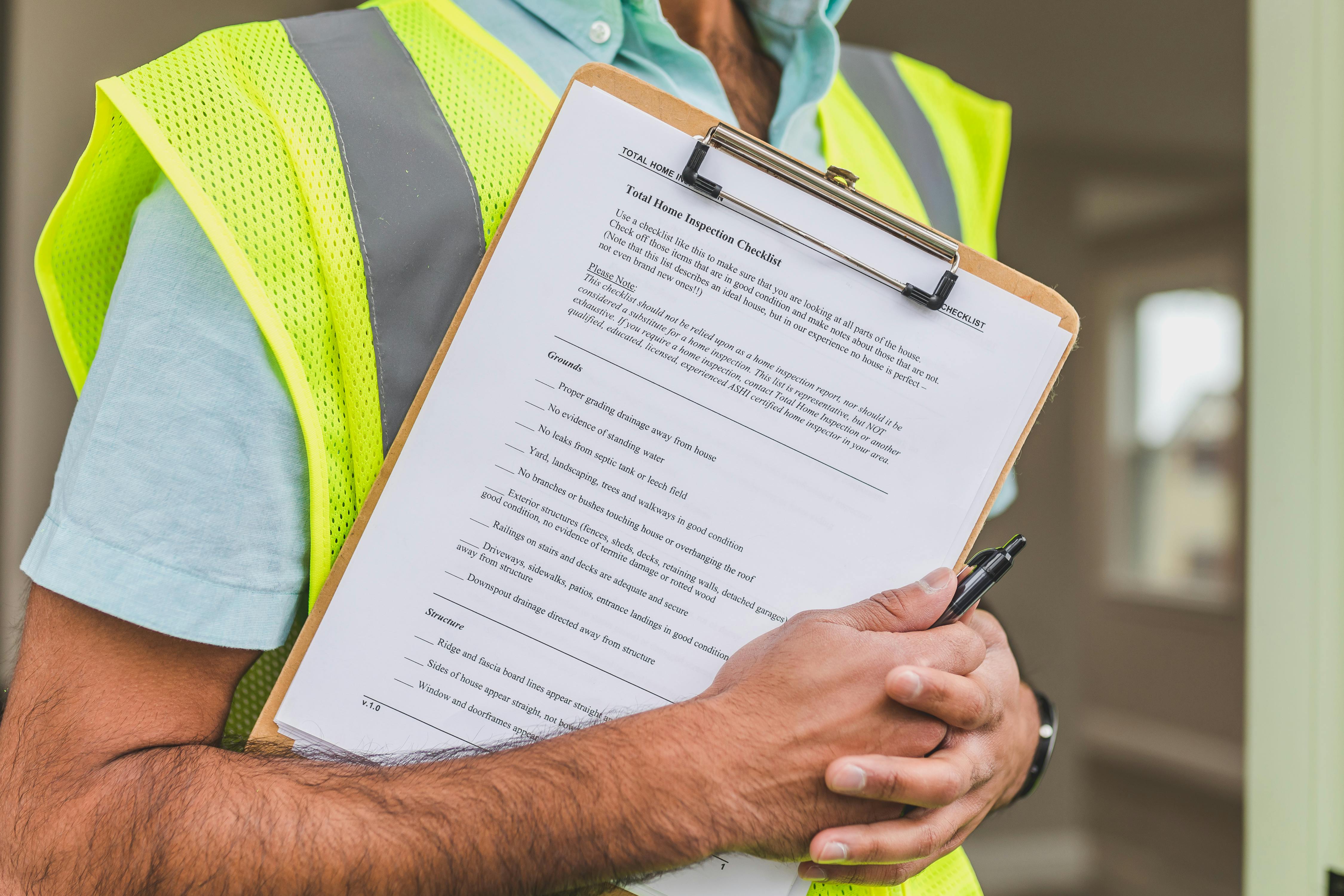 person-holding-clipboard person-holding-clipboard